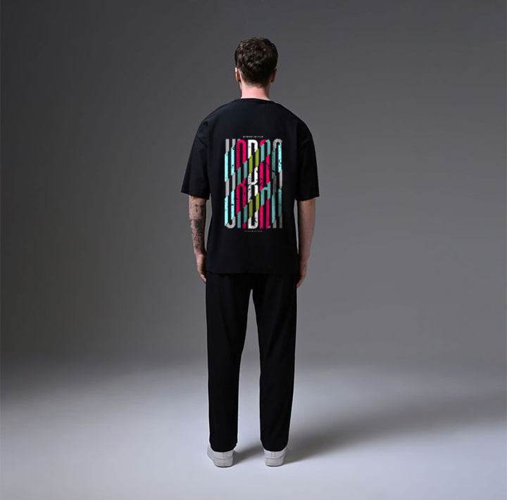 Oversized black streetwear t-shirt with graphic print by DROX